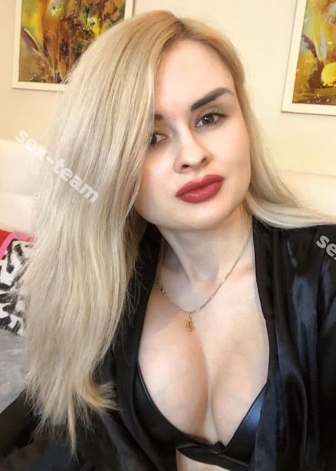 Оля